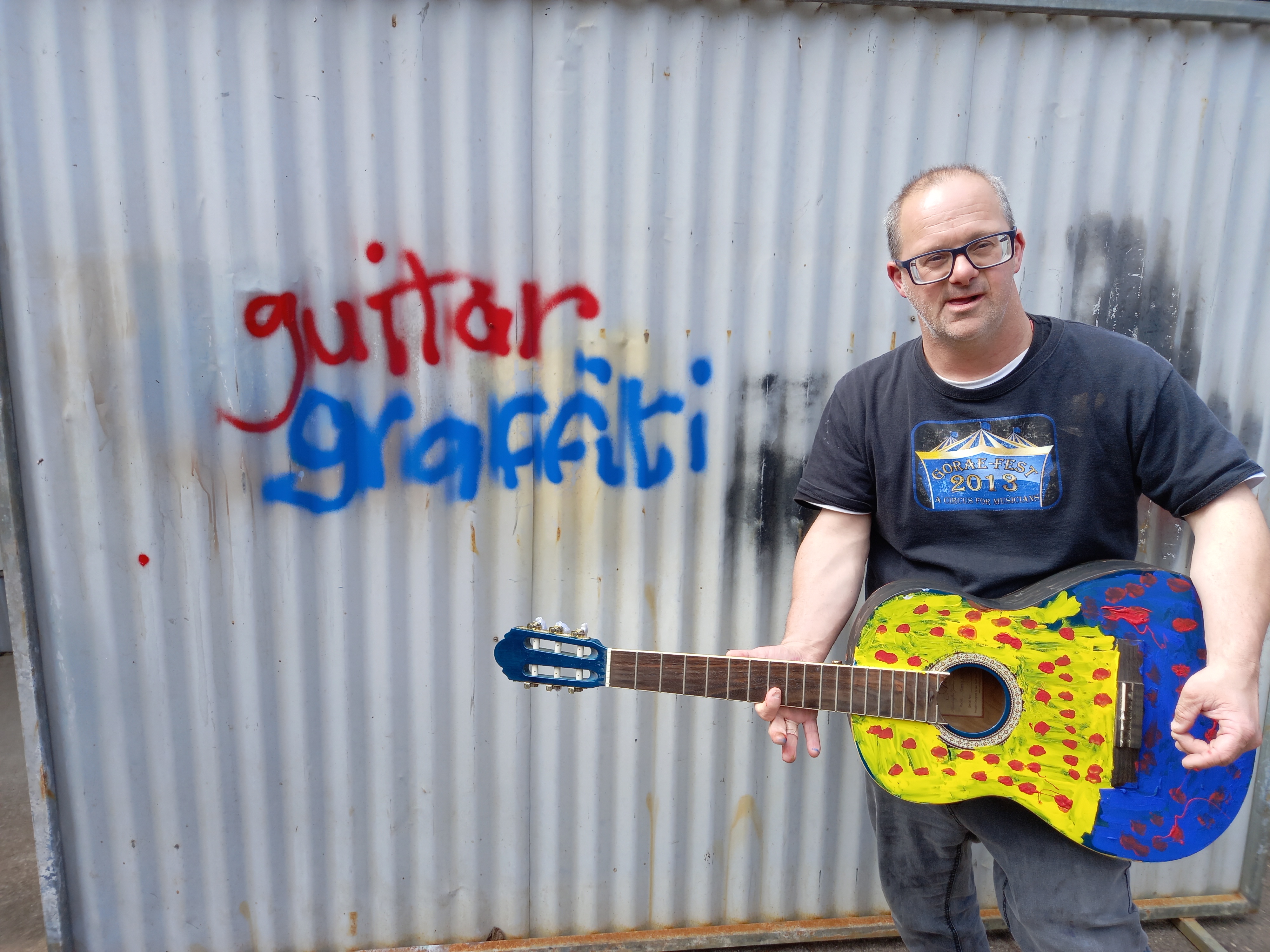 Dave Goebel with painted guitar